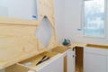 Contractor installing a new laminate kitchen counter top Royalty Free Stock Photo