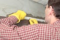 Contractor installing tiles Royalty Free Stock Photo
