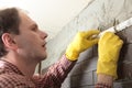 Contractor installing tiles Royalty Free Stock Photo