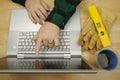 Contractor on Laptop Royalty Free Stock Photo