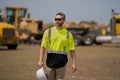 contractor reviewing construction site. Construction contractor overseeing the building. contractor walking at site of Royalty Free Stock Photo