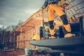 Contractor Worker and the Construction Site Royalty Free Stock Photo