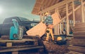 Contractor Worker and the Construction Site with Pickup Truck Royalty Free Stock Photo