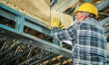 Contractor Worker Installing Mineral Wool Insulation Royalty Free Stock Photo
