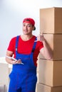 The contractor worker moving boxes during office move Royalty Free Stock Photo