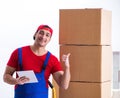 Contractor worker moving boxes during office move Royalty Free Stock Photo