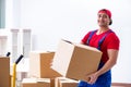 The contractor worker moving boxes during office move Royalty Free Stock Photo