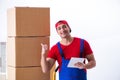 The contractor worker moving boxes during office move Royalty Free Stock Photo