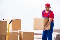 The contractor worker moving boxes during office move Royalty Free Stock Photo