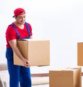 Contractor worker moving boxes during office move Royalty Free Stock Photo
