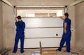 Contractors Installing, Repair, Insulating Garage Door. Garage door seal, garage door replacement, garage door repair.