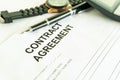 Contracts agreement sign on document paper with black pen. Royalty Free Stock Photo