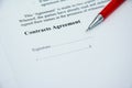 Contracts agreement sign on document paper with red pen Royalty Free Stock Photo