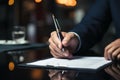 Contractual agreement hand confidently signs, marking the beginning of business collaborations