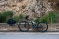 Contrada Rebuttone, Sicily, Italy Electric mountainbike standing against a rugh rock at the Mount Palermo Royalty Free Stock Photo