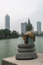 Buddha figure with skylines on the background, Seema Malakaya Buddhist temple, Colombo