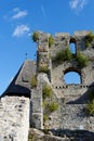 Contrail of the jet plane above ruin of Celje medieval castle in Slovenia