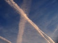 Contrails from a jet plane in the sky Royalty Free Stock Photo