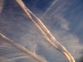 Contrails from a jet plane in the sky Royalty Free Stock Photo