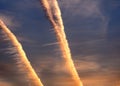 Contrails from a jet plane in the sky Royalty Free Stock Photo