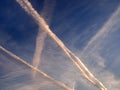 Contrails from a jet plane in the sky Royalty Free Stock Photo