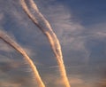 Contrails from a jet plane in the sky Royalty Free Stock Photo