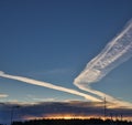Contrails in the morning sky Royalty Free Stock Photo