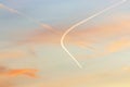 Contrails from several airplanes at sunset Royalty Free Stock Photo