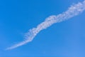 Contrails, vapour trails from the airplane with blue sky background Royalty Free Stock Photo