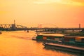 Contrainer ships crossing river during sunset Royalty Free Stock Photo