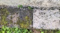 Contrast between dirt old auto block slab paving slabs floor dirty clean pressured washed concrete before and after high pressure Royalty Free Stock Photo