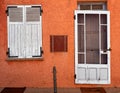 contrast between front door, windows and wall of an old house in Provence, France Royalty Free Stock Photo