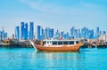 Old boats and modern buildings in Doha, Qatar Royalty Free Stock Photo