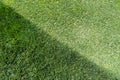 Contrast in Green: Bird\'s Eye View of Unevenly Trimmed Grass