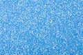 Contrast holographic glitter background in exquisite blue tone for Christmas design.