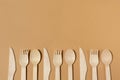 Contrast lighting. Eco friendly wooden cutlery. Fork, knife, spoon. Plastic Free Concept Royalty Free Stock Photo