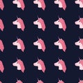 Contrast seamless pattern with simple pink unicorn faces. Fairytale horse ornament on dark navy blue background Royalty Free Stock Photo