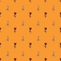 Contrast tulip shapes seamless stylized pattern. Simple flower ornament on orange background Royalty Free Stock Photo