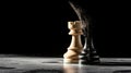 Contrasting chess rooks on textured surface with dramatic lighting Royalty Free Stock Photo