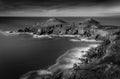 Contrasts in the surf, The Rumps, Pentire Point, Cornwall Royalty Free Stock Photo