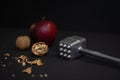 Contrasts Unveiled: Apple, Cracked Nut, and Hammer