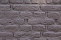 Contrasty close up filled frame background wallpaper shot of grey rough pavement bricks of a sidewalk road forming squares, Royalty Free Stock Photo