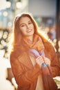 Contre-jour outdoor portrait of beautiful redhead woman Royalty Free Stock Photo