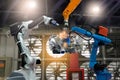 Control automation robot arms the production of factory parts engine manufacturing industry robots and mechanical Royalty Free Stock Photo