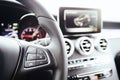 Control buttons on steering wheel. Car interior. Royalty Free Stock Photo