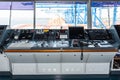 Control console on the navigational bridge of the cargo ship.