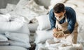 Control of grain in warehouse for preparation of craft beer at factory during covid-19 Royalty Free Stock Photo