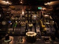 Control knobs in airplane cockpit closeup with selective focus. Royalty Free Stock Photo