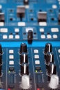 Control knobs on the console of a DJ deck Royalty Free Stock Photo