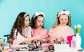 Control oil. Apply lipstick. Prevent acne. Kids makeup. Skin care concept. Cosmetics for children. Beauty and fashion Royalty Free Stock Photo